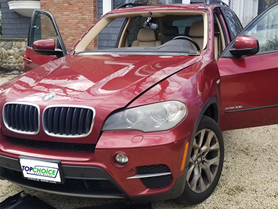 Windshield Replacement Red BMW broken windshield  before replacement