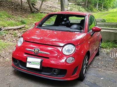 Winshield Replacement Red Fiat with Broken Windshield
